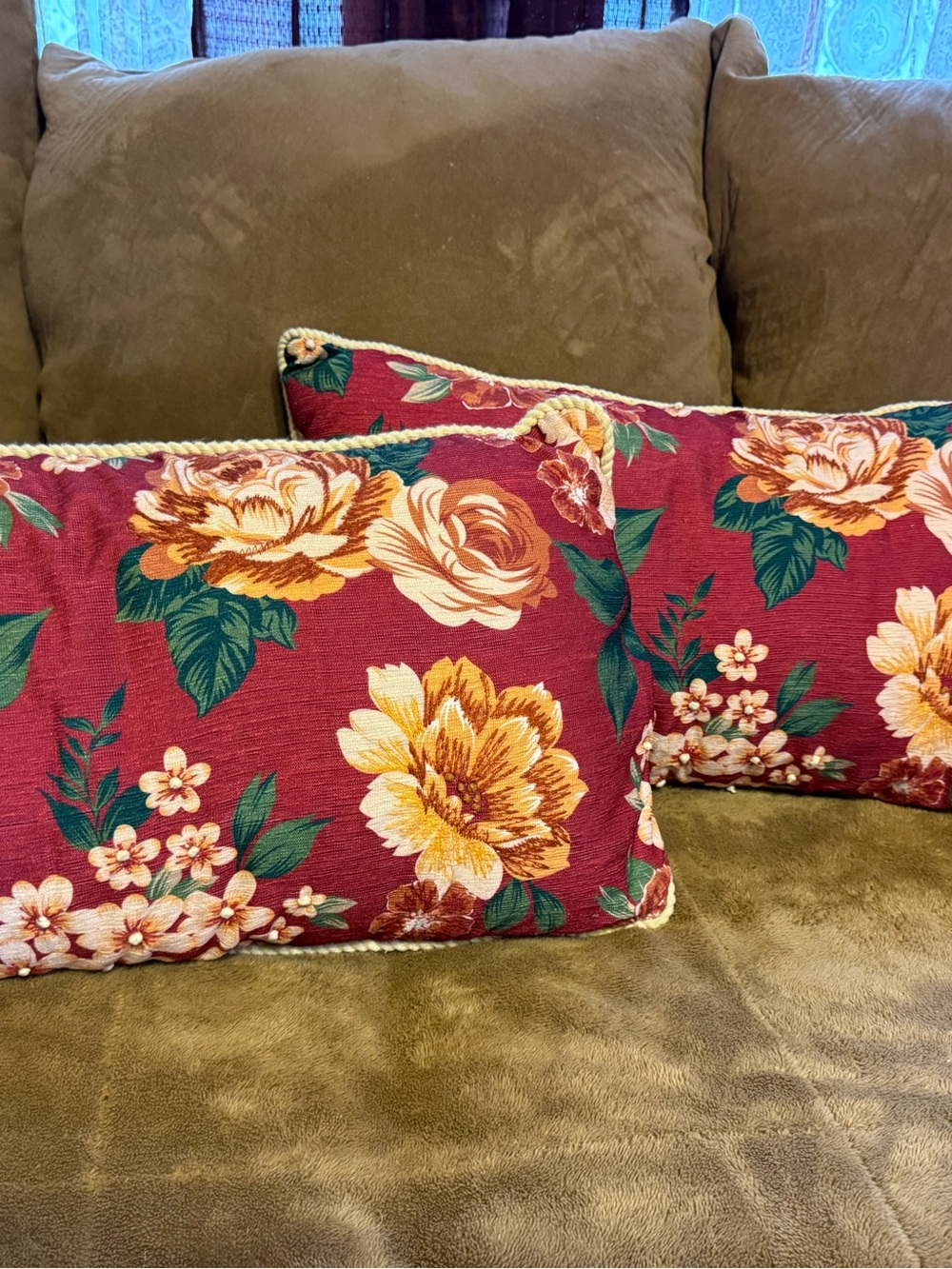 Red Floral Accent Pillows with Yellow Bloom Detail